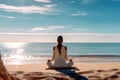 Calm woman meditating on beach near the sea. Healing Reflections