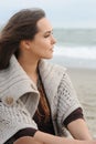 Calm woman portrait alone on a sea beach Royalty Free Stock Photo