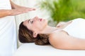 Calm woman receiving reiki treatment Royalty Free Stock Photo