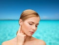 Calm woman touching her ear Royalty Free Stock Photo