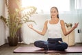 Calm yogi female in lotus pose, meditate