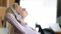 Calm young woman listen to music in headphones Royalty Free Stock Photo