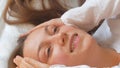 Calm young woman sleeping well in comfortable cozy bed on white soft pillows linen and waking up in the morning,insomnia Royalty Free Stock Photo