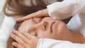 Calm young woman sleeping well in comfortable cozy bed on white soft pillows linen and waking up in the morning,insomnia Royalty Free Stock Photo