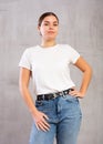 Calm young woman standing in confident pose Royalty Free Stock Photo