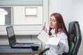 A calm, young woman at work