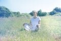 Calm young yoga woman with eyes closed for centered mindfulness