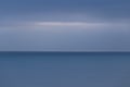 Calming blue end of the day sea shot Royalty Free Stock Photo