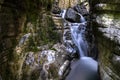 Calming Mountain Stream in Stones. Nature Relaxing Landscape. Torrent in natural landscape with waterfall, geological phenomenon