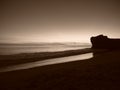 Calming reflections of sepia sunset at El Matador state beach Royalty Free Stock Photo