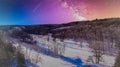 twilight skies over winter field with hills Royalty Free Stock Photo