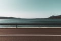 Calming sea, mountains and road