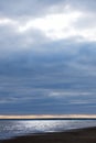 Calmness water and cloud skies above seascape. Royalty Free Stock Photo