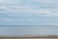 Calmness water and cloud skies above seascape. Royalty Free Stock Photo