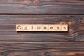 calmness word written on wood block. calmness text on cement table for your desing, concept