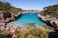 Calo des Moro, Majorca, Spain - August 7, 2020: People enjoying one of the most beautiful coves with turquoise waters in Majorca Royalty Free Stock Photo