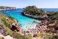 Calo des Moro, Majorca, Spain - August 7, 2020: People enjoying one of the most beautiful coves with turquoise waters in Mallorca Royalty Free Stock Photo
