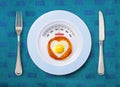 Calorie tot of fried egg Royalty Free Stock Photo