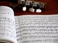Calssical guitar and partiture book Royalty Free Stock Photo