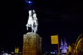 Calvary Sculpture with Cologne Cathedral and hohenzollern bridge