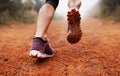 These calves were made for running. Closeup shot of a woman running on a trail on a misty morning.
