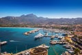 Calvi beach and old town with harbour on Corsica