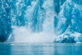 Calving ice at Dawes Glacier in Alaska, USA Royalty Free Stock Photo