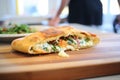 calzone with gooey cheese pull