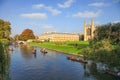 Cam river with King`s College in Cambridge University under blue sky