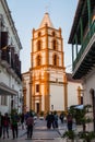 CAMAGUEY, CUBA - JAN 25, 2016: People walk on the pedestrian street Maceo towards Soledad church in Camague