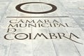 Camara Municipal de Coimbra. The logo of the town hall of Coimbra, Portugal, is applied on the sidewalk in front of the entrance Royalty Free Stock Photo