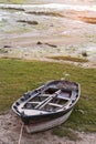 A fishing boat beached in Cambados Spain
