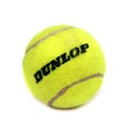 Camberley, UK - Feb 22nd 2017: Yellow Dunlop tennis ball on whi
