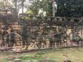 Cambodia Architecture. Bas-relief. Battle with elephants along the Terrace of Elephants. Wall Carving in Angkor Thom Royalty Free Stock Photo