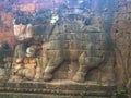 Cambodia Architecture. Bas-relief. Battle with elephants along the Terrace of Elephants. Wall Carving in Angkor Thom Royalty Free Stock Photo
