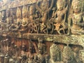 Cambodia Architecture. Bas-relief. A rough-carved figure on the frontage of the Terrace of the Leper King. Wall Carving