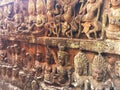 Cambodia Architecture. Bas-relief. A rough-carved figure on the frontage of the Terrace of the Leper King. Wall Carving