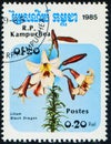 CAMBODIA - CIRCA 1985: stamp shows flowering plant Black dragon (Lilium)