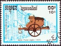 CAMBODIA - CIRCA 1989: A stamp printed in Cambodia from the `Coaches` issue shows Light mail coach, 1805, circa 1989. Royalty Free Stock Photo