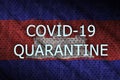 Cambodia flag and Covid-19 quarantine inscription. Coronavirus or 2019-nCov virus