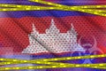 Cambodia flag and Covid-19 quarantine yellow tape. Coronavirus or 2019-nCov virus concept