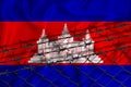 Cambodia flag development, fence mesh and barbed wire. Emigrants isolation concept. With place for your text Royalty Free Stock Photo