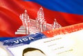 Cambodia immigration document close up. Passport visa on Cambodia flag. Cambodia visitor visa in passport,3D rendering. Cambodia