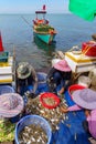 Cambodia. Kep. Crab market. Return of fishing