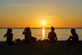 Cambodia. Koh Rong Samloem Island, young girls sitting on a beach