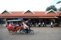 Cambodia people riding trimotorcycle and cart carrier for service cambodian and foreign traveler send receive travel visit ancient