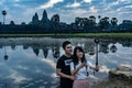 Cambodia. Siem Reap Province. A couple of tourist make a selfie at Angkor Wat Royalty Free Stock Photo