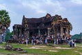 Cambodia. Siem Reap Province. A crowded group of tourists take a photo of Angkor Wat Royalty Free Stock Photo