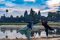 Cambodia. Siem Reap Province. Tourists have their photo taken in front of Angkor Wat Royalty Free Stock Photo