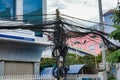 Cambodia, Siem Reap 08/12/2018 twisted wires of power lines, chaos of urban communications, cable bundle